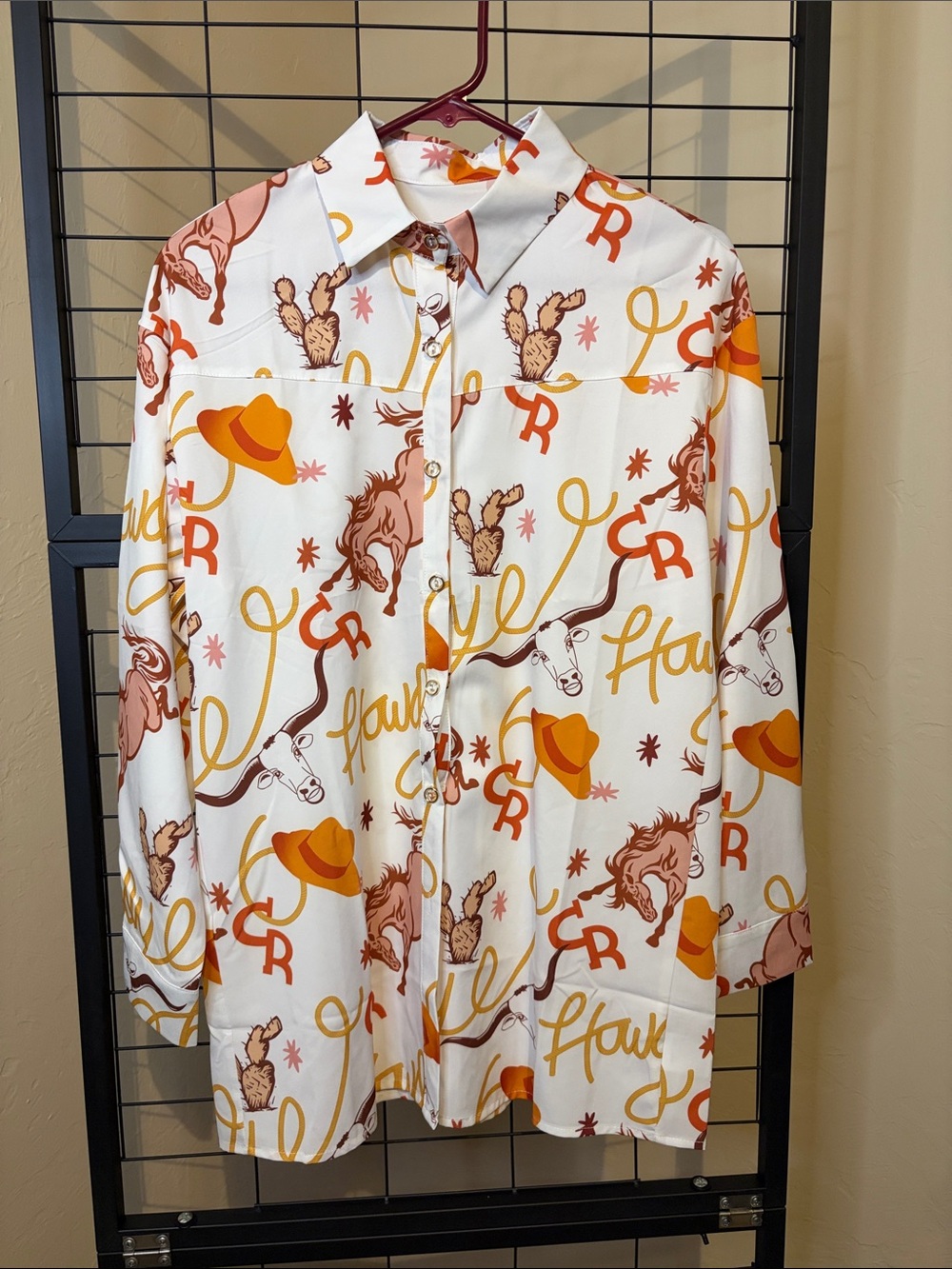 Long sleeve cowboy print blouse